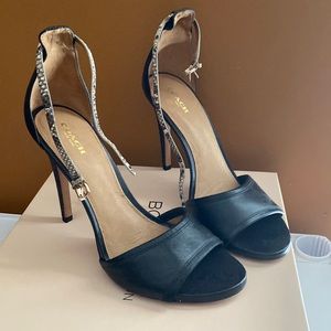 Black leather Coach sandals